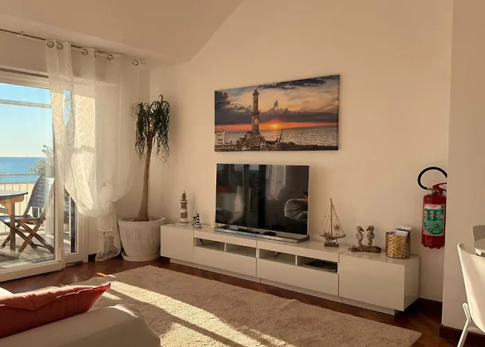 Апартаменты Attico Con Terrazza Fronte Mare A Cavi Di Лаванья